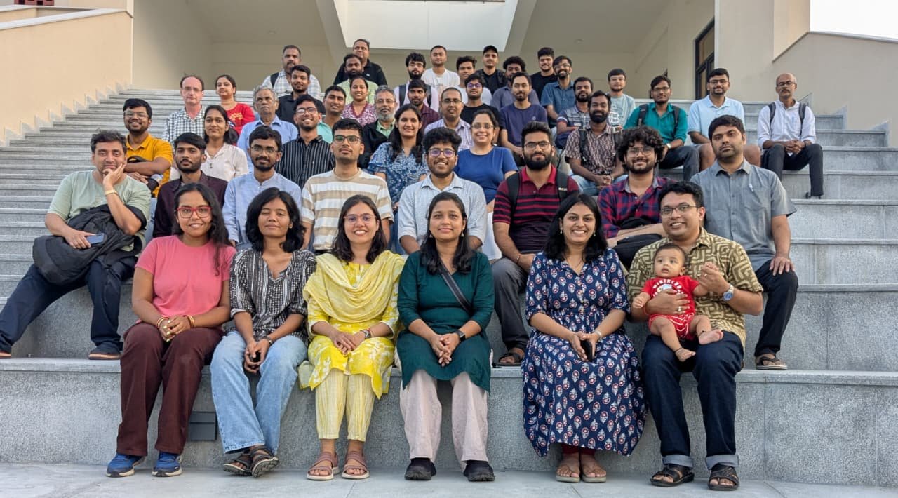 Workshop participants gathered on the steps at CMI